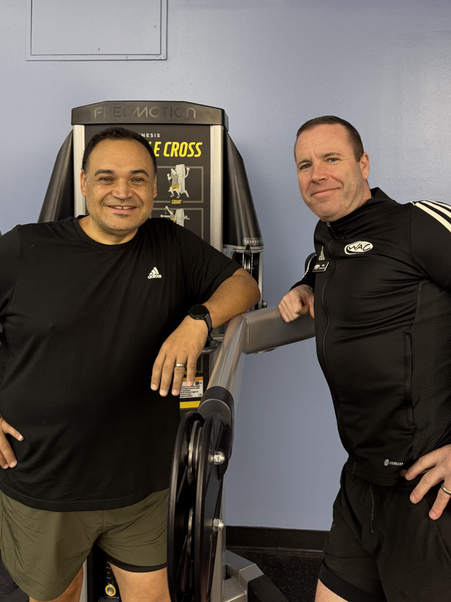 Personal trainer and client