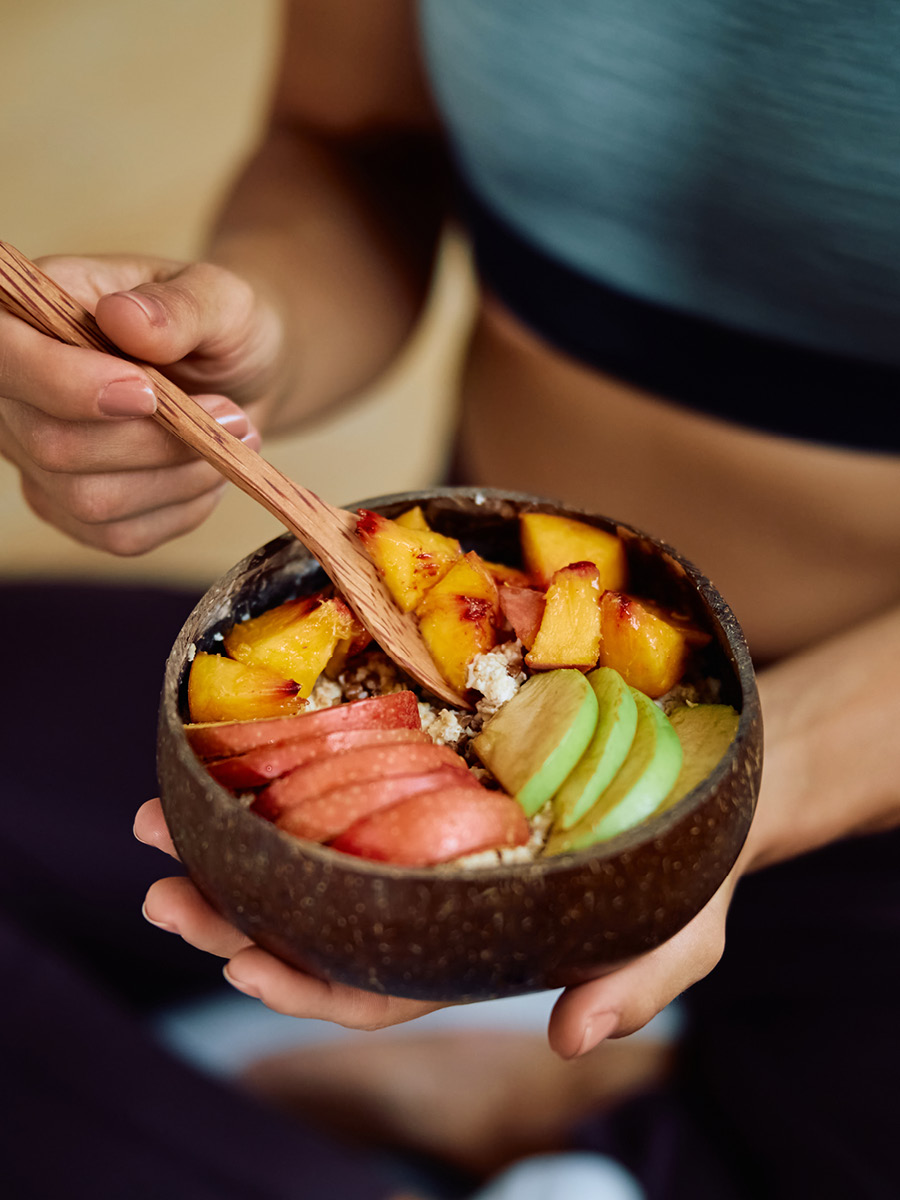 woman eats healthy meal before working out