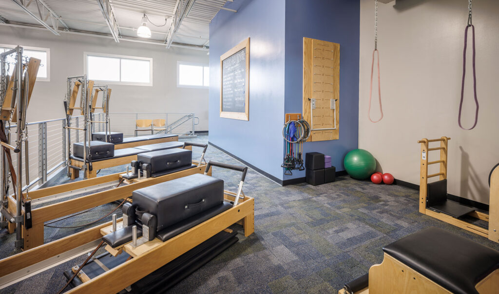 Pilates Reformers on the upper deck at the WAC Menomonee Falls